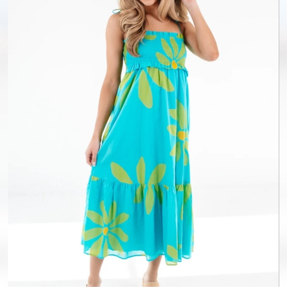 J.Marie Indi Tie Strap Midi Dress in a vibrant blue and green floral print.